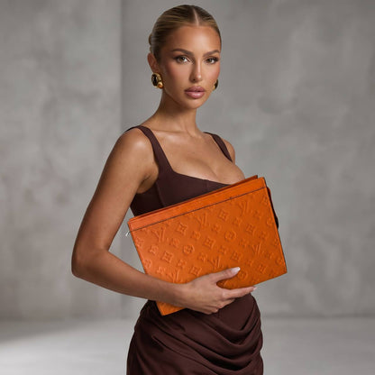 Louis Vuitton Monogram Embossed Leather Pochette 🧡✨