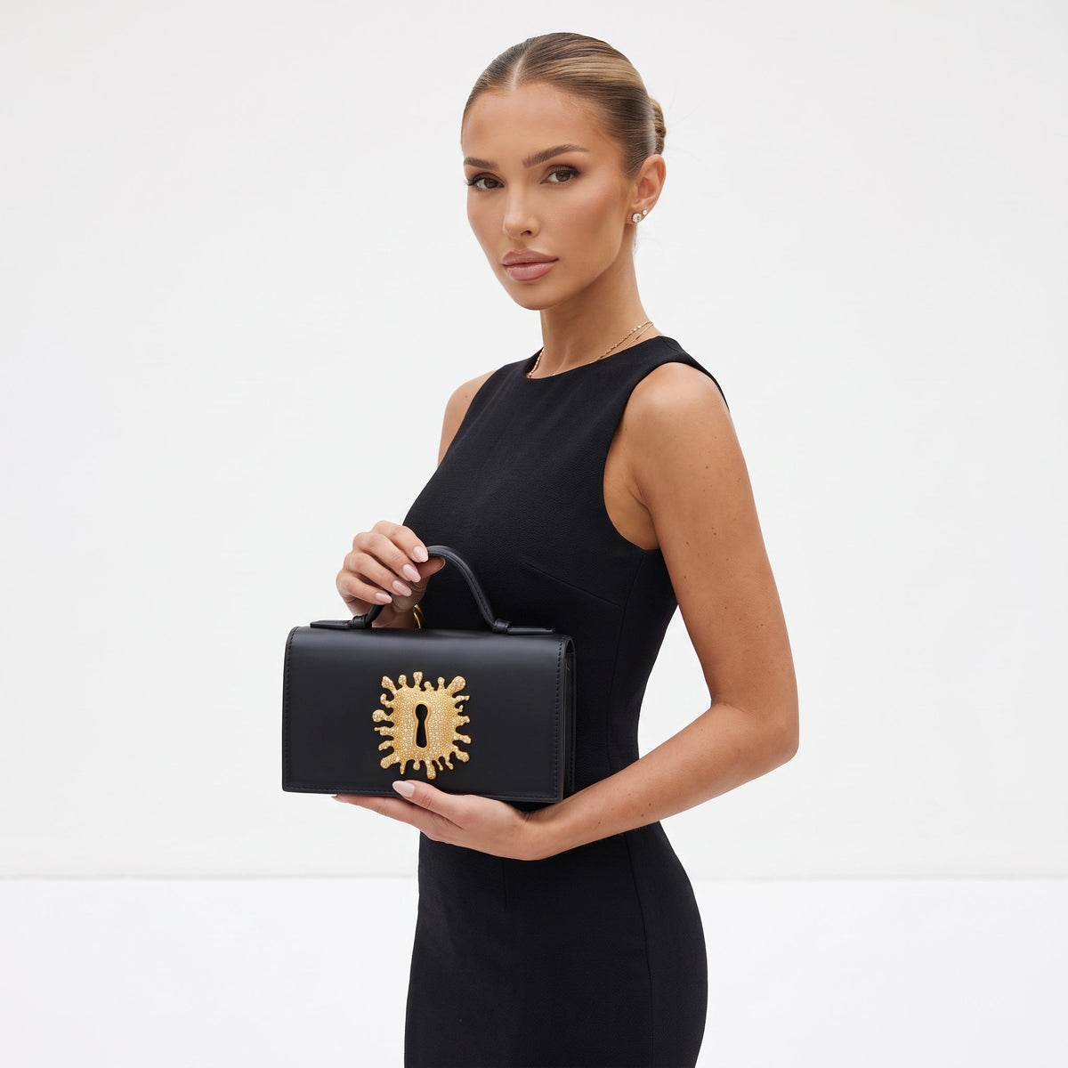 Schiaparelli keyhole Top-Handle Bag – Black Gold Sunburst 👜✨ - MASTERPIECE