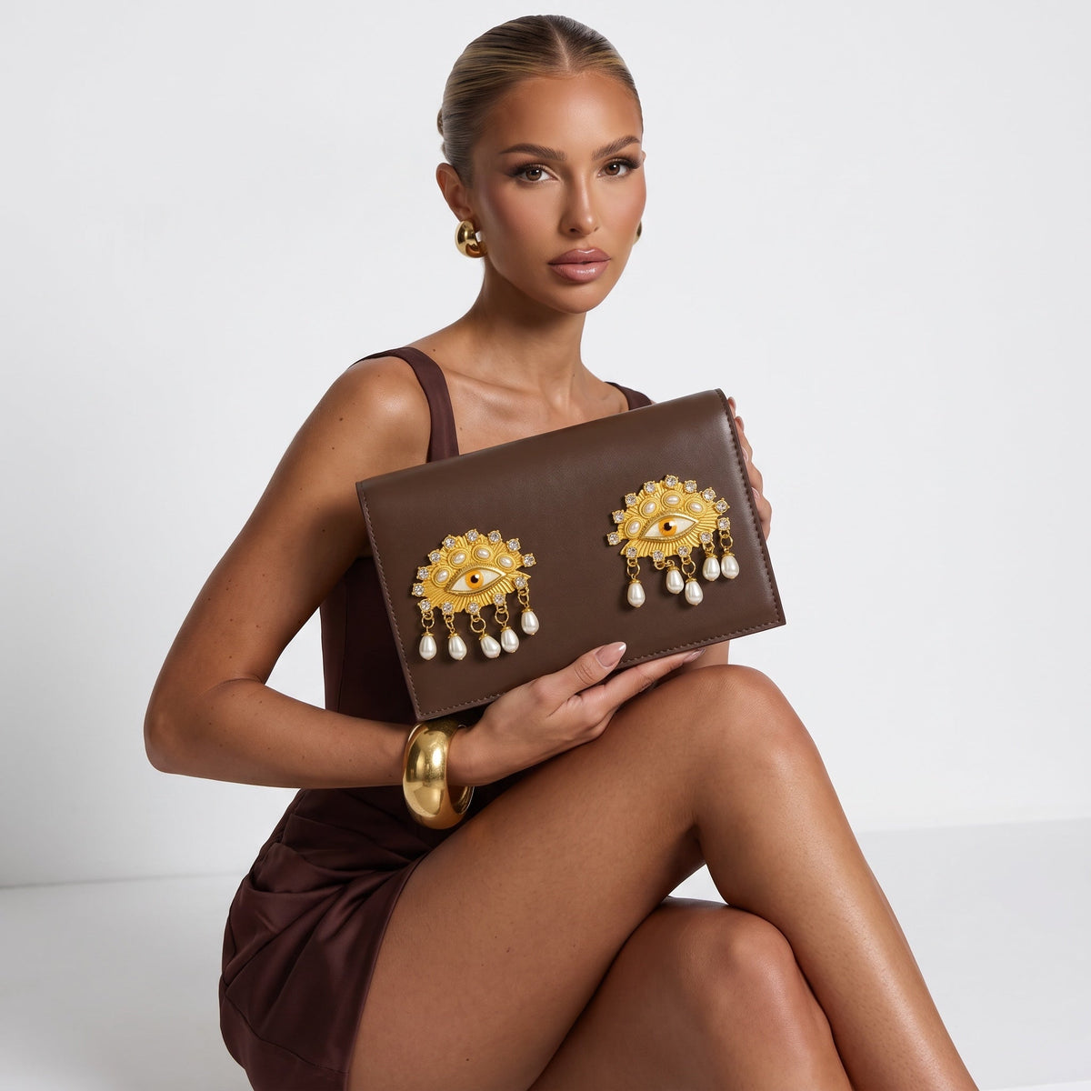 Schiaparelli Leather Clutch – Brown Eye Embellished ✨👜 - MASTERPIECE