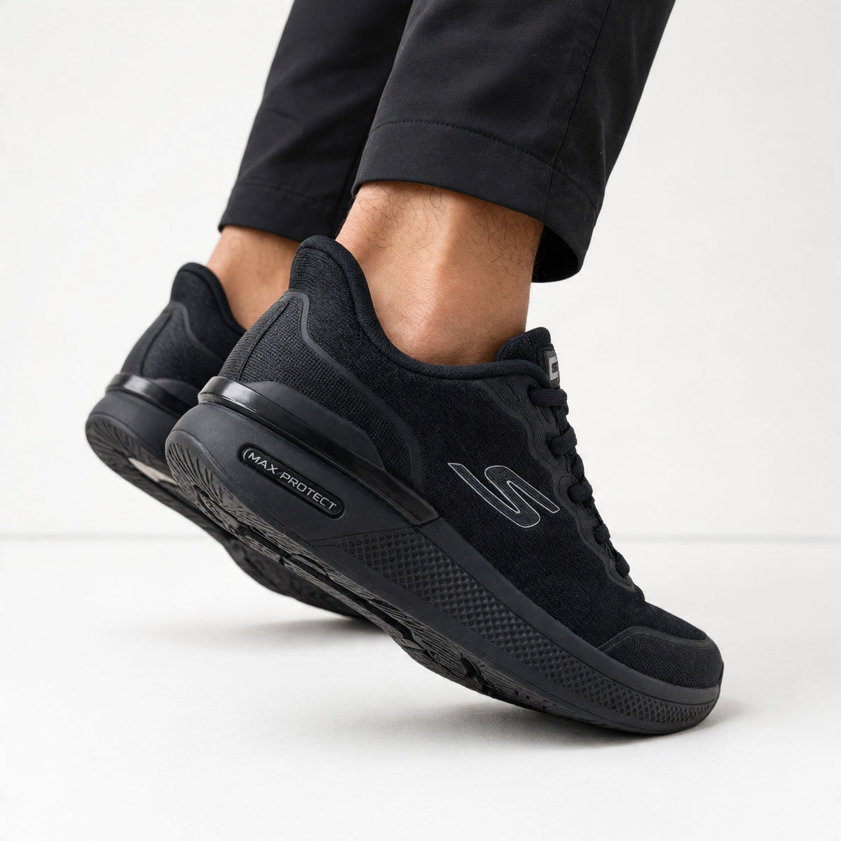 Skechers Max Protect – All-Black Trainer - MASTERPIECE